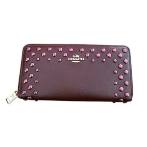 Coach Accordion Zip Around Wallet with lacquer rivets.